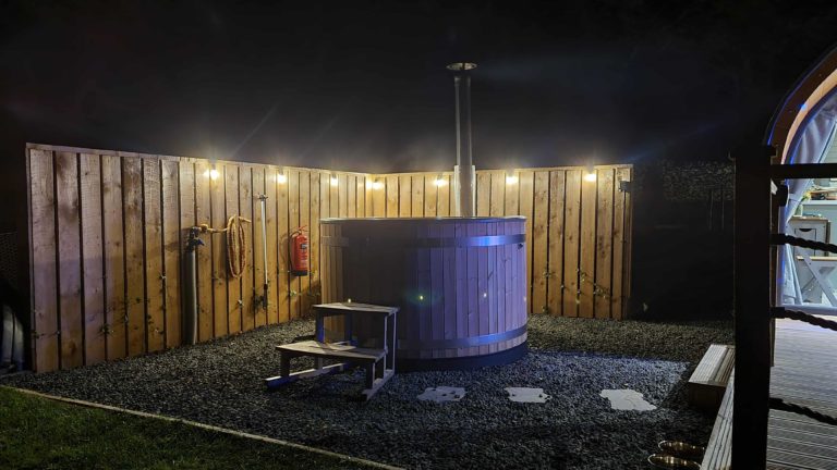 Night time Hot Tubs at Stouslie Snugs
